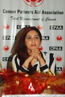 Indian Bollywood actress Neetu Chandra and pop singer Neha Bhasin at a cancer screening camp organised by the Cancer Patient Aid Association (CPAA) with Mumbai