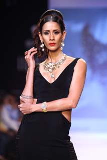 Kristina Akheeva walks the ramp at IIJW 2013 Day 4