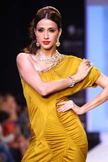 Kristina Akheeva walks the ramp at IIJW 2013 Day 4