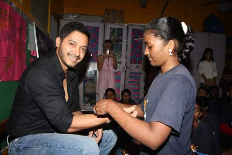 Girls at Akansha tie a rakhi to Shreyas Talpade