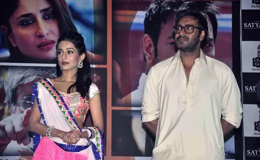 Amrita Rao and Ajay Devgn at Satyagraha movie team during the promotion