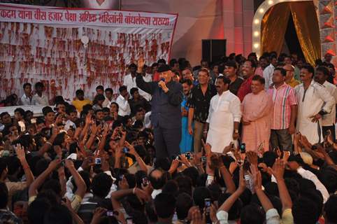 Prem Chopra speaks to the crowd at Dahi Handi celebrations