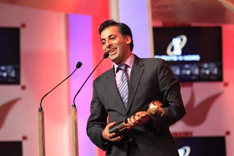 AB Moosa receiving Best Film Distributor award at SAIFTA 2013