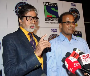Amitabh Bachchan & the first Crorepati of KBC 2013 Mr Taj Mohammad Rangrez