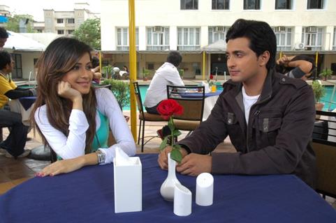 A still image of Varun and Avantika