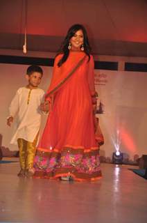 Celebs walk the ramp at the Peace Walk ramp show by designer Rajat Tangri at Welingkar College in Mumbai