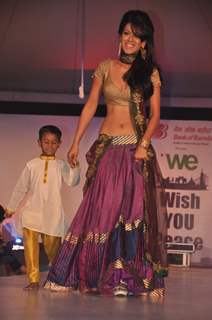 Celebs walk the ramp at the Peace Walk ramp show by designer Rajat Tangri at Welingkar College in Mumbai