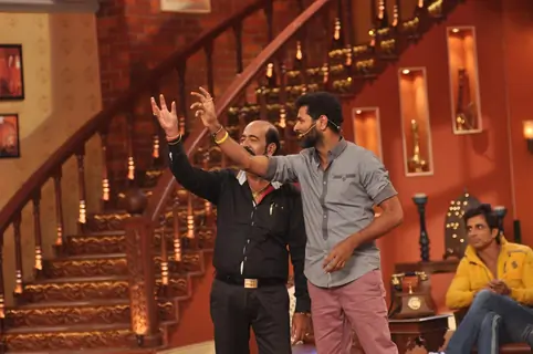 Prabhu Dheva performs with a fan on Comedy Nights with Kapil