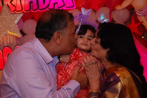 Samairra with her grand parents at her birthday party