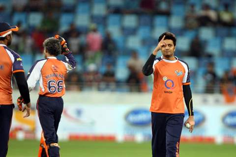 The Veer Marathi team celebrates a wicket taken