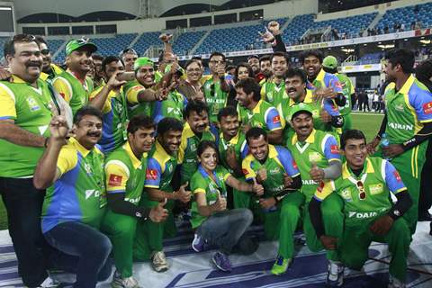 The Kerala Strikers team pose for a picture