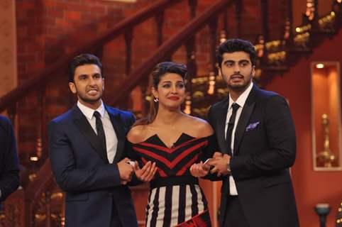 Ranveer and Arjun tug onto Priyanka during promotiions of their film Gunday