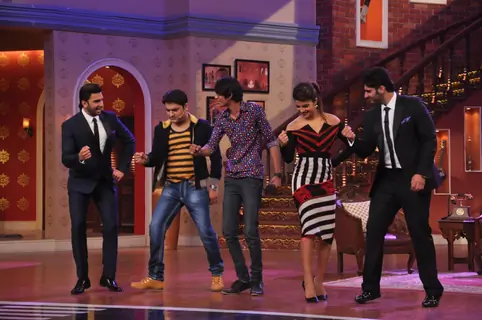 The cast of Gunday and Kapil Sharma perform with an audience member