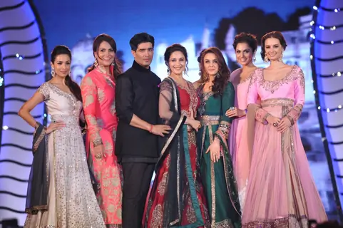 Manish Malhotra with the some of the leading ladies of Bollywood at the event