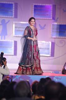 Madhuri Dixit walks the ramp at the Save & Empower The Girl Child event