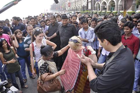 Karan Johar clicks pictures of the masses for TV show Mission Sapne