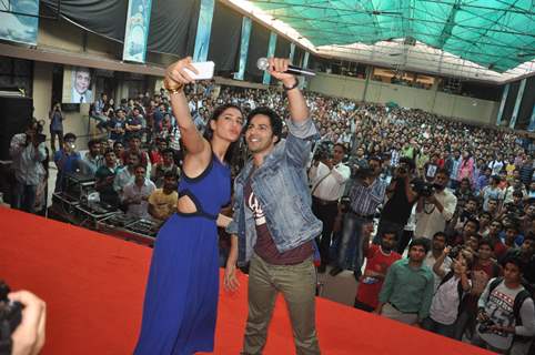 Nargis and Varun get a selfie of themselves with the crowd