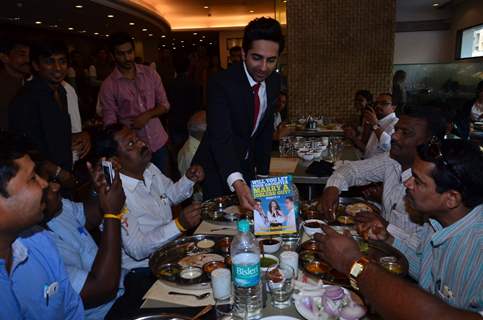 Ayushmann distributes pamphlets among the public