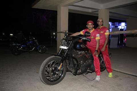 Raj and Karan show off their bike at the Box Cricket league inaugral match