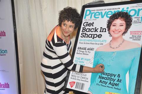 Manisha Koirala signs the cover of health magazine Prevention