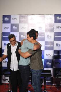 Tiger Shroff huggs Aamir Khan at the Trailer launch of Heropanthi