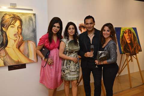 Marc Robionson and Perizaad Zorabian were at Nawaz Modi Singhania's art show