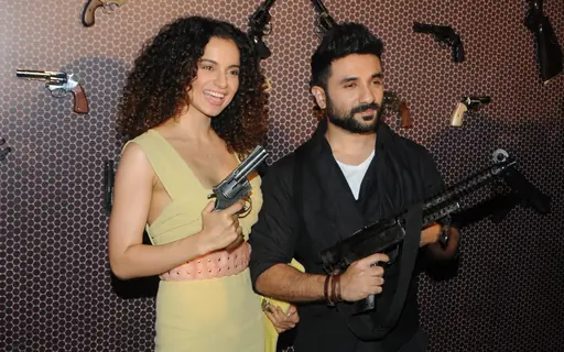 Kangana Ranaut and Vir Das pose with guns at Revolver Rani's Press Conference