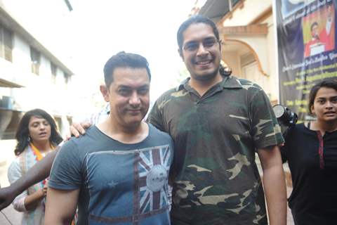 Aamir & Junaid Khan vote at a polling station in Mumbai