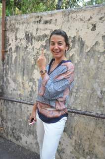 Perizaad Zorabian votes at a polling station in Mumbai