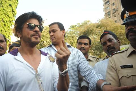 Shahrukh Khan poses with an inked finger