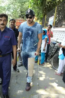 Zayed Khan arrives with a broken leg to cast his vote at a polling station in Mumbai