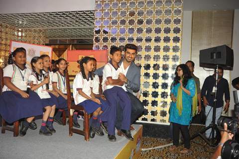 Arjun Kapoor joins the children at a P&G Shiksha event