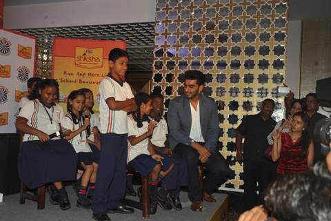 Arjun Kapoor joins the children at a P&G Shiksha event