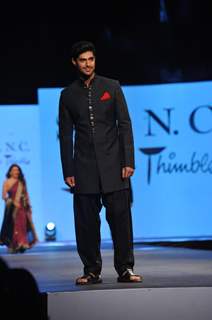 Tanuj Virwani walked the ramp at the 'Caring with Style' fashion show at NSCI