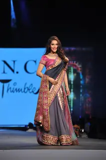 Rashmi Nigam walks the ramp at the 'Caring with Style' fashion show at NSCI