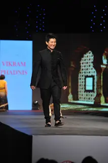 Meiyang Chang walked the ramp at the 'Caring with Style' fashion show at NSCI