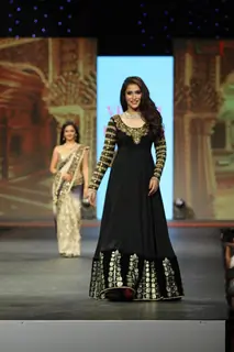 Rashmi Nigam walks the ramp at the 'Caring with Style' fashion show at NSCI