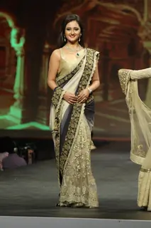 Rashmi Desai walks the ramp at the 'Caring with Style' fashion show at NSCI