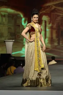 Yuvika Chaudhary walked the ramp at the 'Caring with Style' fashion show at NSCI