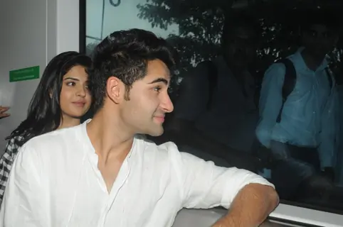 Armaan and Deeksha enjoying the outside view from metro .
