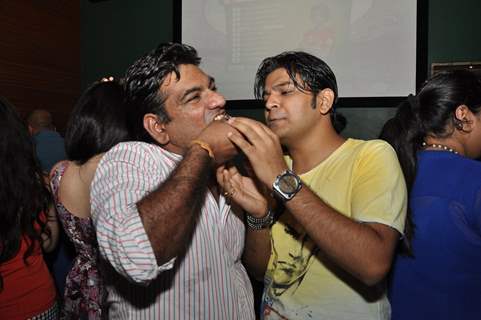 Ankit Tiwari feeding cake to Sujit Tiwari