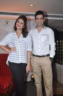 Irfan Pathan and Huma Qureshi poses for the media