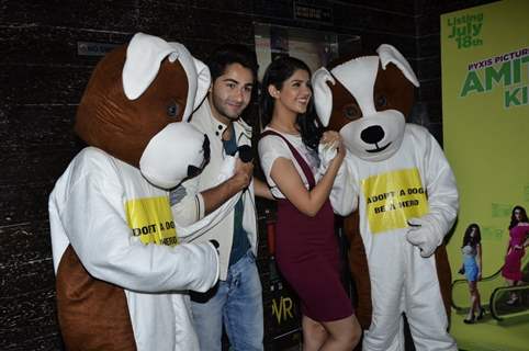 Armaan and Deeksha pose with the Mascots of the Adopt a Dog Campaign