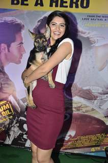 Deeksha Seth poses with a puppy