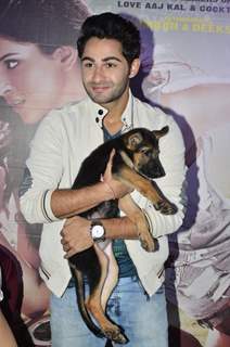 Armaan Jain poses with a puppy