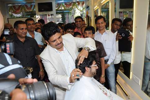 Aditya Thackeray getting a hair cut