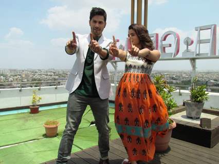 Varun Dhawan and Alia Bhatt strike a pose for the cameras at Ahmedabad