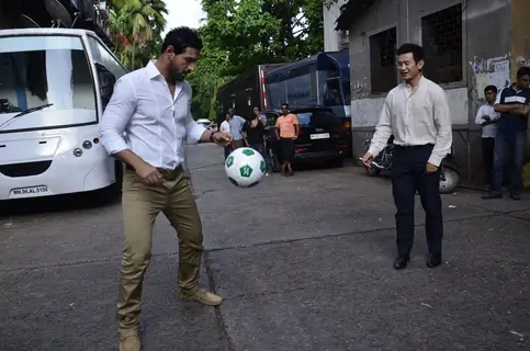 John Abraham playing football with Baichung Bhutia at Castrol Photo Shoot