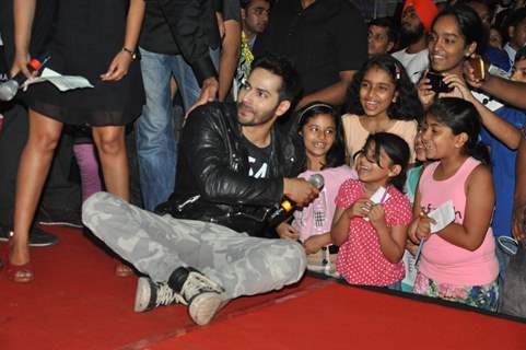 Varun Dhawan interacting with his younger fans