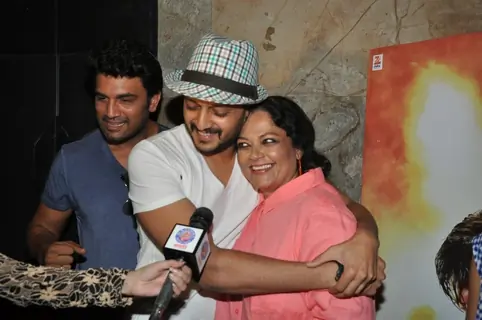 Riteish Deshmukh hugs Tanvi Azmi at the Screening of Lay Bhari at Lightbox